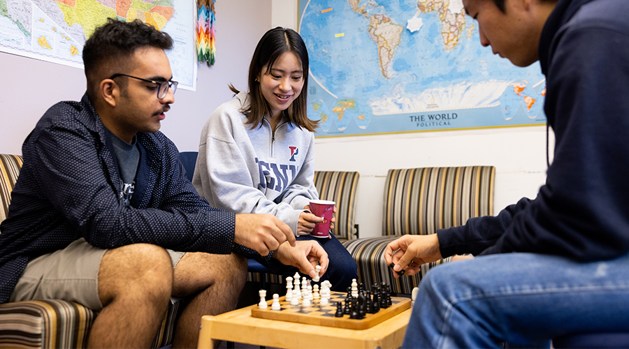 Students unwind with a game of chess